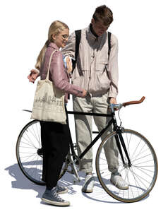 teenage boy and girl with a bike standing and talking