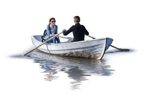 cut out man and woman riding a rowing boat