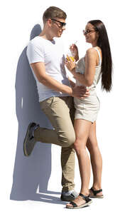 cut out couple standing and leaning against the wall