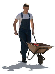 cut out man pushing a wheelbarrow