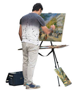 cut out man standing and painting on a canvas