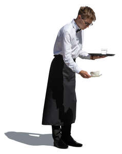 cut out young male waiter serving coffee