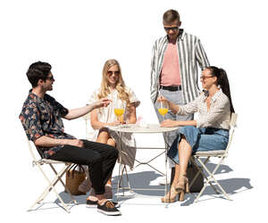 cut out group of young people sitting in a cafe on a fine summer day