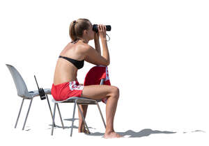 cut out lifeguard sitting and looking with binoculars
