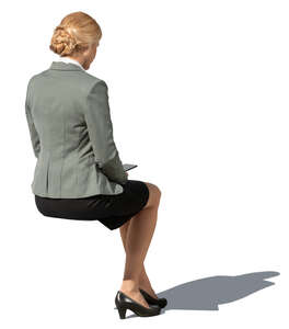 cut out businesswoman sitting seen from back angle