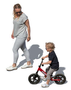 cut out mother and son with a bike walking seen from above