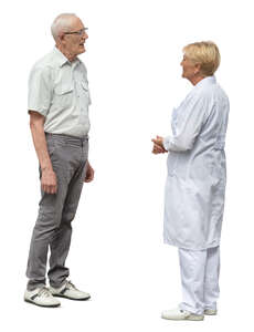 cut out elderly man standing and talking to a doctor