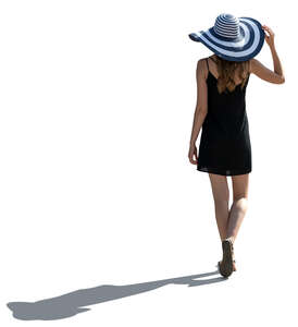 cut out backlit woman with a large striped hat