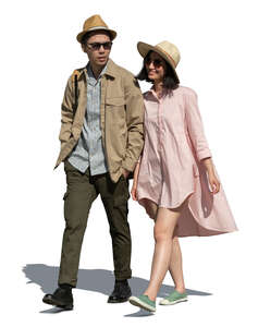 cut out young couple walking arm in arm on a summer day