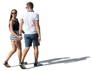 cut out man and woman walking and holding hands