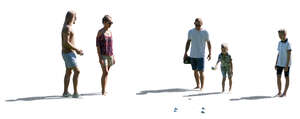 cut out group of adults and children playing petanque