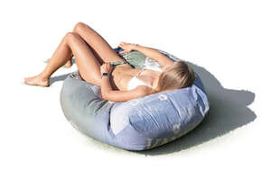 cut out woman lying in a bean bag chair