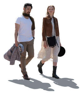 two cut out backlit people walking