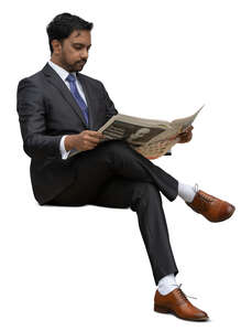 cut out indian businessman sitting and reading a newspaper