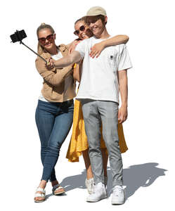 cut out cheerful group of young people standing and taking a selfie
