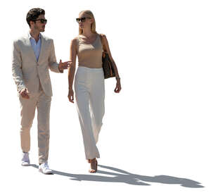 cut out backlit man and woman walking and talking