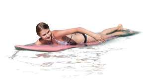 cut out woman paddling on a surfboard