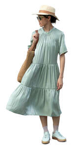 cut out asian woman in a green summer dress standing