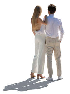 cut out backlit couple in white summer clothes standing