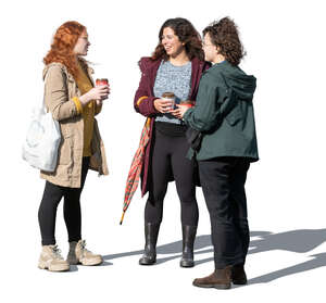 three cut out women standing and talking in autumn