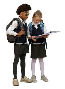 two cut out schoolgirls standing and reading a book