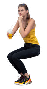 cut out woman sitting and drinking smoothie