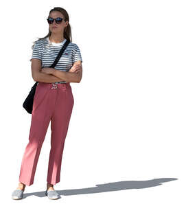 cut out young woman standing in partial shade