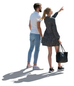 cut out backlit man and woman standing and looking at smth