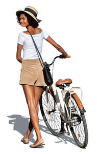 cut out woman with a bicycle walking and looking back over her shoulder