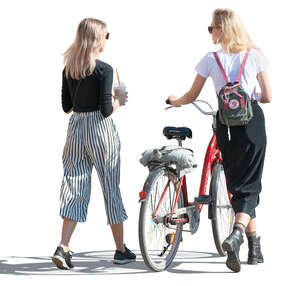 two women with a bike walking and talking