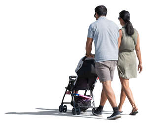 couple with a baby stroller walking