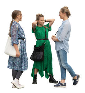 three cut out women standing and talking