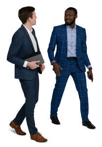 two cut out businessmen walking and talking