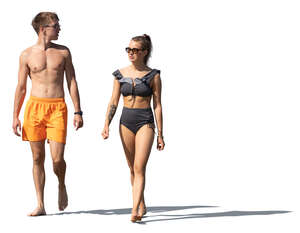 cut out young man and woman walking in resort