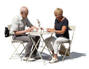 cut out older man and woman sitting in a cafe