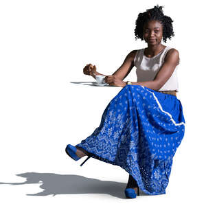 african woman sitting in a cafe