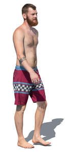 cut out man in swimming shorts walking