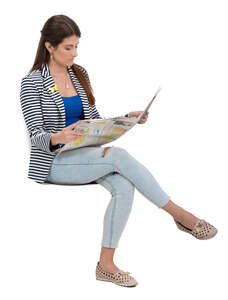 cut out woman sitting and reading a newspaper