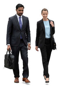 two cut out businesspeople walking