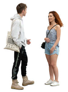 two cut out young people standing and talking