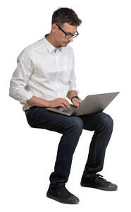 cut out man with a laptop sitting and working