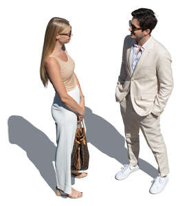 cut out man and woman standing and talking seen from above
