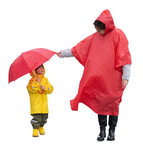 cut out woman and her little walking on a rainy day 