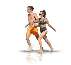 two cut out young people running on the beach