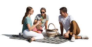 cut out group of three people having a picnic