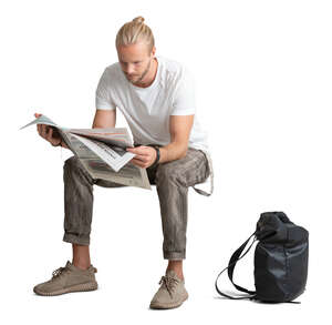 cut out man sitting and reading a newspaper