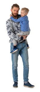 cut out man standing and holding his son in his arms