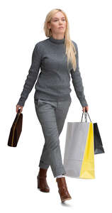 cut out woman with shopping bags walking