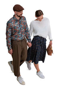 cut out man and woman walking hand in hand