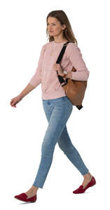 cut out woman in jeans and sweater walking